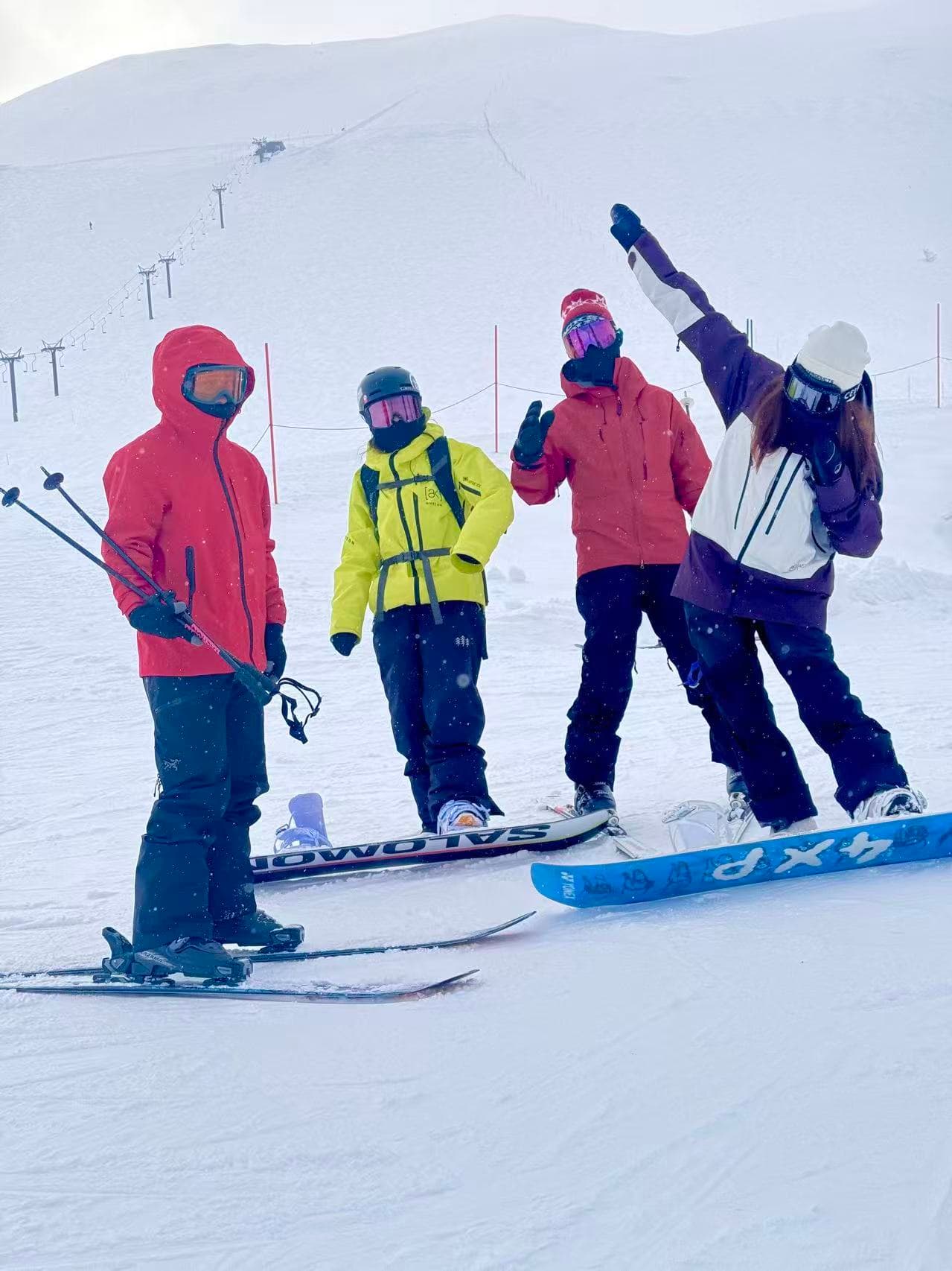 Ski and snowboard guests enjoying a winter day together