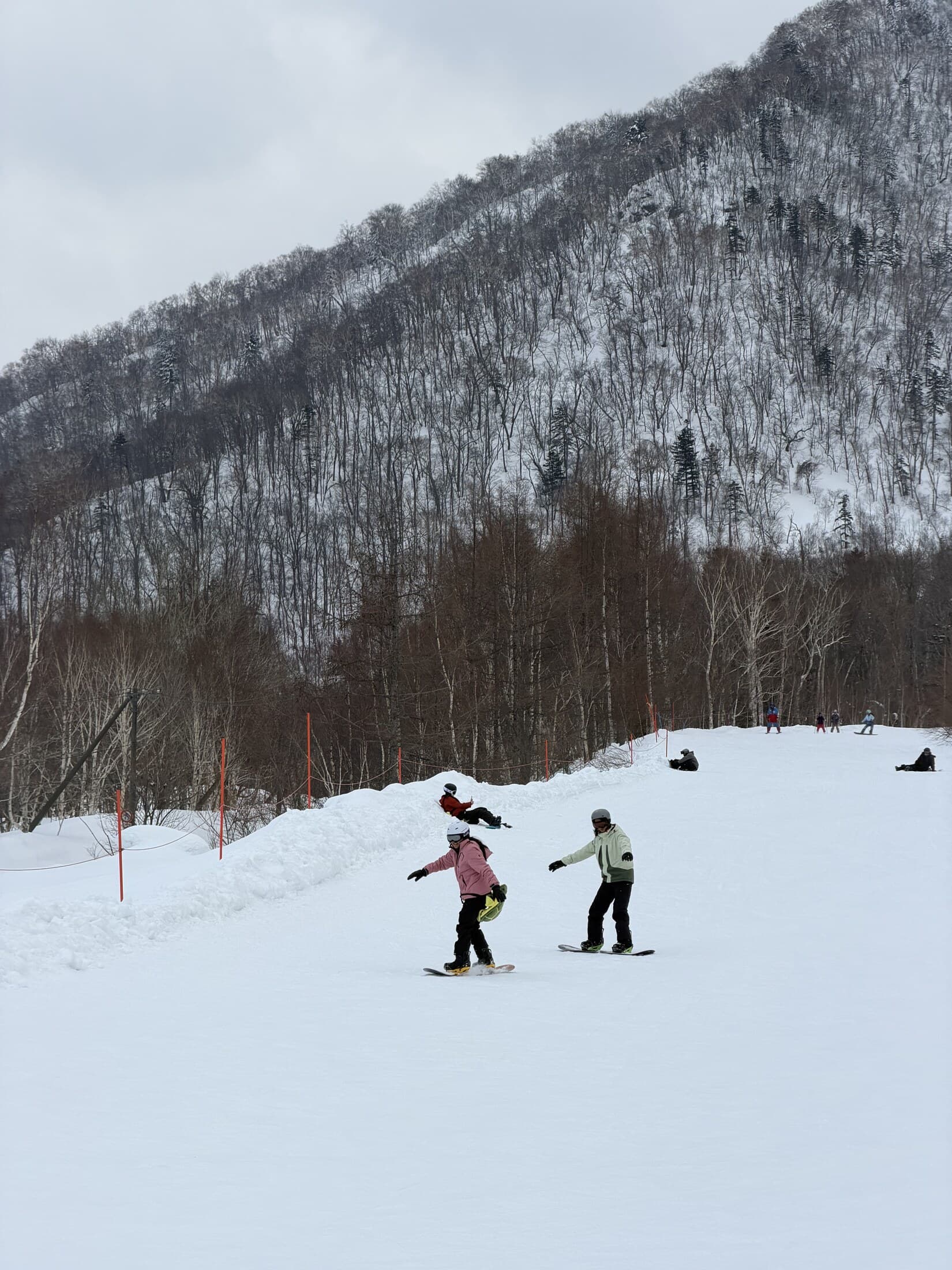 Two snowboarders on the slope